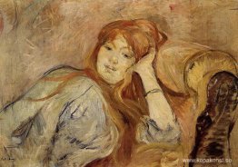 Ung flicka lutad på hennes armbåge Ung flicka lutad på hennes armbåge