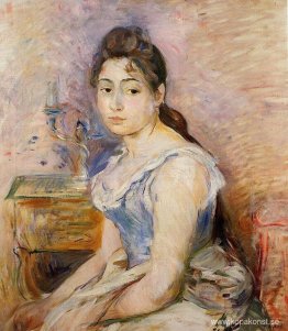 Ung kvinna i en blå blus Ung kvinna i en blå blus