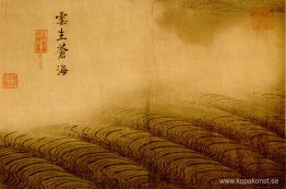 Vattenalbum - moln som stiger upp från det gröna havet Vattenalbum - moln som stiger upp från det gröna havet