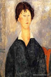 Porträtt av en kvinna med vit krage