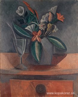 Blommor i en grå burk