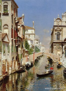 En venetiansk kanal med Scuola Grande di San Marco och Campo San