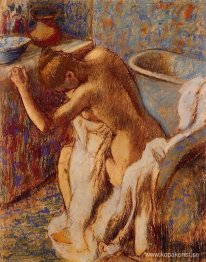 Kvinna som torkar sig