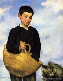 En pojke med en hund