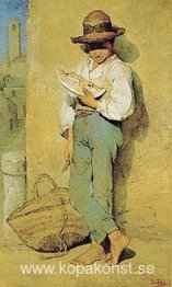 Pojke som äter vattenmelon