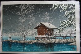 Kansau helgedom i snö vid Lake Tazawa