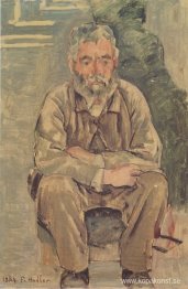 Sittande skäggig man