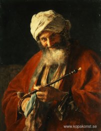 Orientalisk man med ett rör