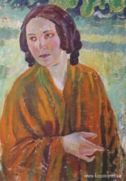 Kvinna i en gul sjal