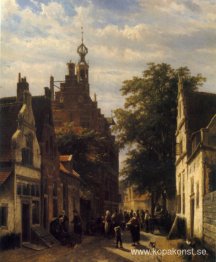 Figurer på en gata i Delft