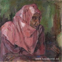 Porträtt av en kvinna som bär en rosa hijab
