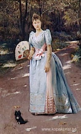 Kvinna i en trädgård