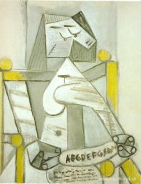 Sittande kvinna med stavningsbok