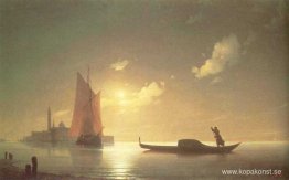 Gondolier på havet vid natten