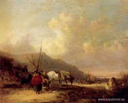 En livlig strandscen