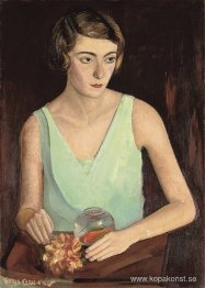 Kvinna i grön klänning