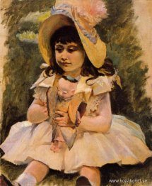 Liten flicka med en japansk docka