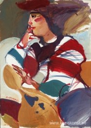 Teaterfigur på en gul soffa