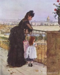 Kvinna och barn på balkongen