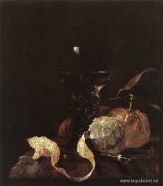 Stilleben med citron, apelsiner och ett glas vin