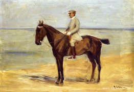 Ryttare på stranden mot vänster