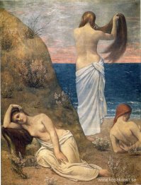 Unga flickor på kanten av havet