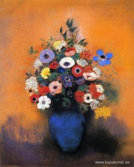 Minosas, anemoner och löv i en blå vas