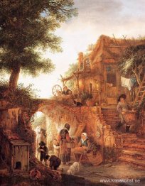 Kvinna som säljer frukt vid en stuga