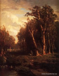 Jägare med hund som hoppar en flock