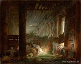 En eremit ber i ruinerna av ett romerskt tempel