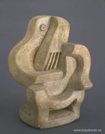 Gitarrspelare i fåtölj