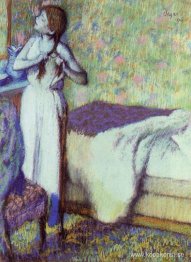 Ung flicka som flätar hennes hår