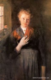 Flicka vid fönstret