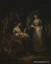 Två kvinnor med en baby som samtalar i en trä