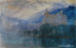 Chateau de Neuchatel i skymningen, med Jurabergen bortom