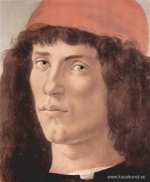 Porträtt av en ung man med röd keps