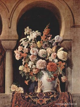 Vas med blommor på fönstret i ett harem