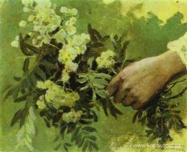 En hand med blommor