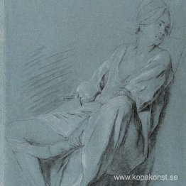 Sitter ung kvinna i skjorta