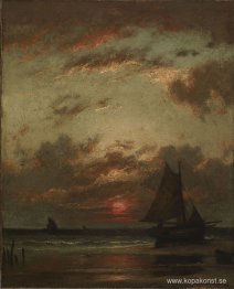 Solnedgång vid kusten