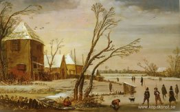 En frusen flod med skridskoåkare En frusen flod med skridskoåkare