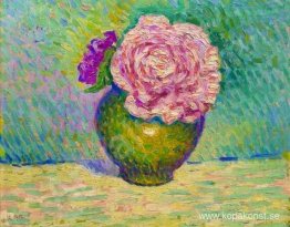 Fleur rose dans un vas Fleur rose dans un vas