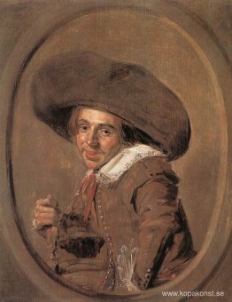 En ung man i en stor hatt En ung man i en stor hatt