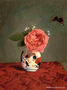 Trädgårdsros och blå glöm mig inte i en vas Trädgårdsros och blå glöm mig inte i en vas