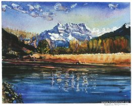 Liten flod som heter Eau-froide sett i Villeneuve, med bergskedj Liten flod som heter Eau-froide sett i Villeneuve, med bergskedj