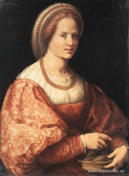 Dam med en korg med spindlar Dam med en korg med spindlar