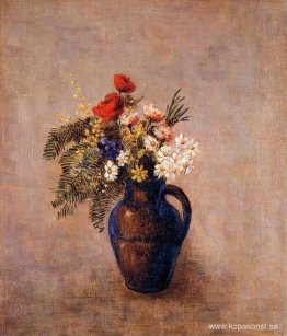 Bukett av blommor i en blå vas Bukett av blommor i en blå vas