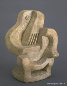 Gitarrspelare i fåtölj Gitarrspelare i fåtölj