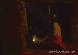 Hopi indian vid en härd Hopi indian vid en härd