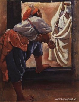 Marocko. Figur i dörröppningen Marocko. Figur i dörröppningen